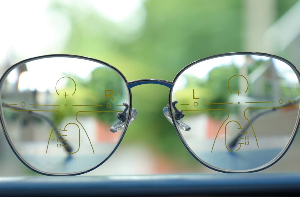 A close-up of progressive eyeglasses outlining its near, intermediate, and distance zones.